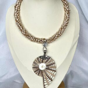 Shell pendant with pearl beads