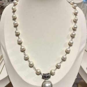 Mother of Pearl & fresh water pearl on silver.