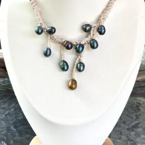 Dark peacock freshwater pearls hand knotted